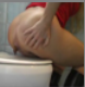 A blonde woman with a red shirt takes a huge dump while sitting on the toilet. Over 2 minutes.